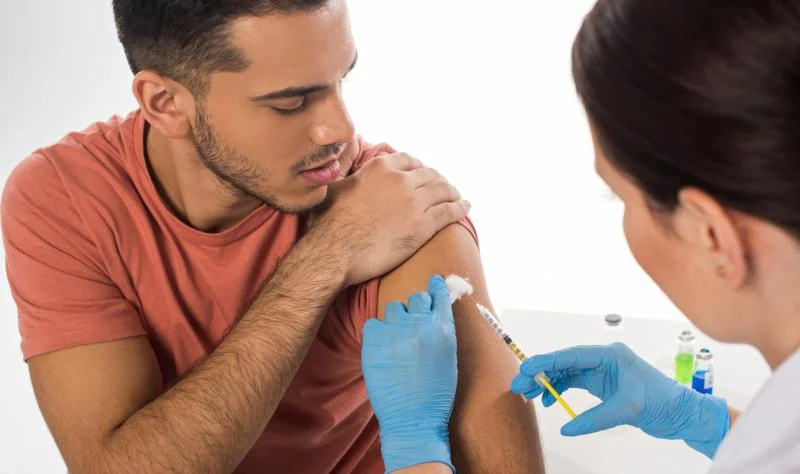HPV vaccination may halve men's cancer risk, study suggests