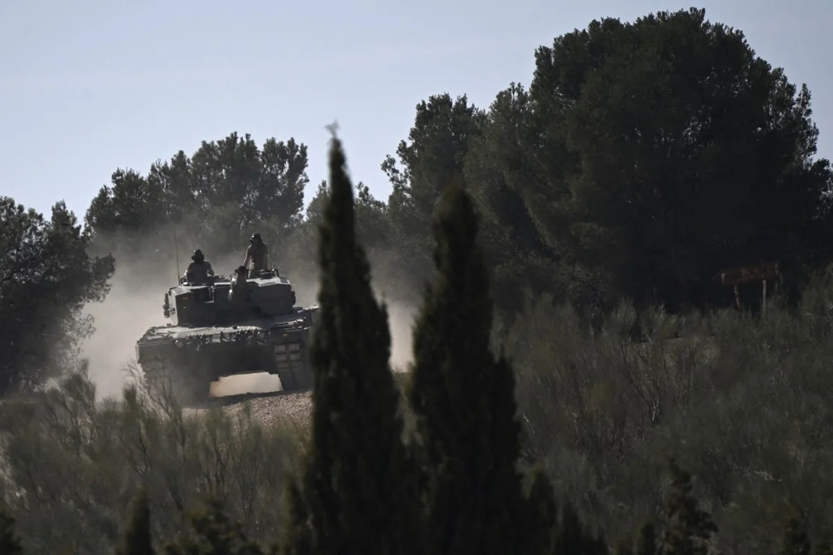 Zelenskyy Visits Front Line Amid Ukraine's Summer Offensive and Russian Spies.