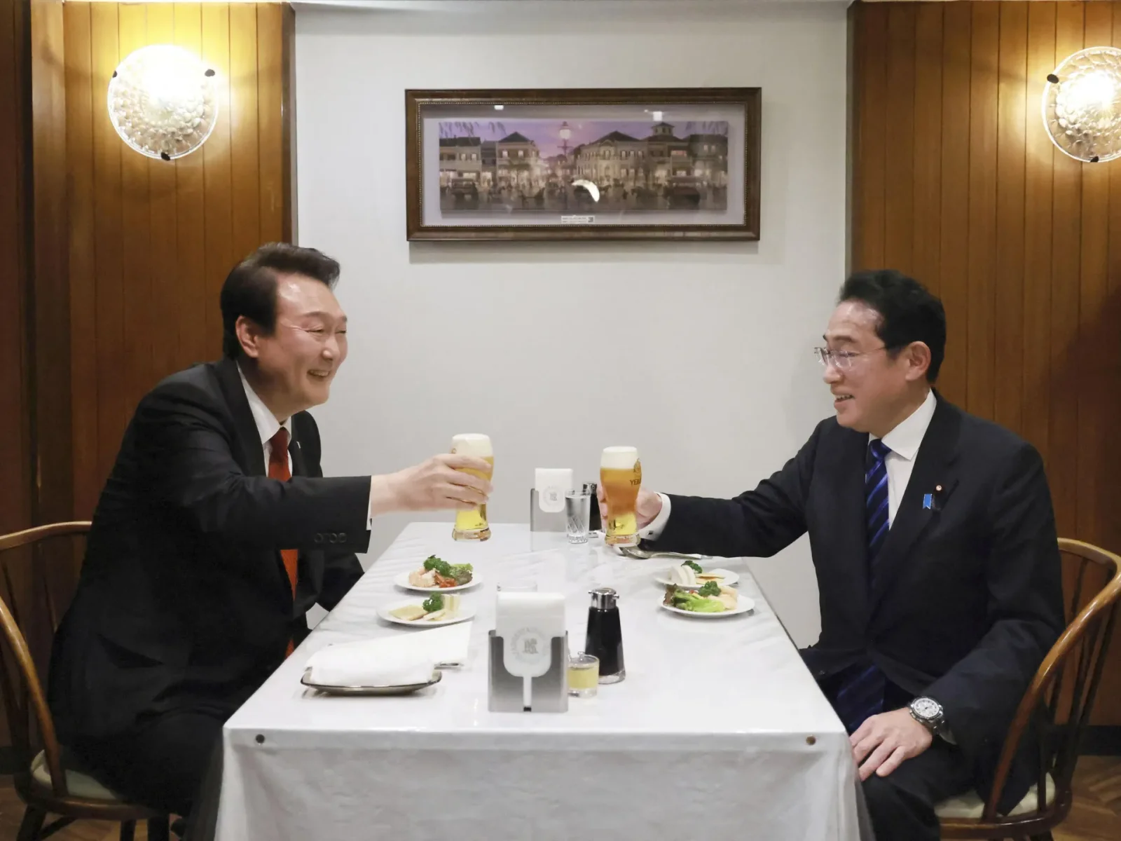 Japan and South Korea pledge to mend ties and boost economic cooperation.
