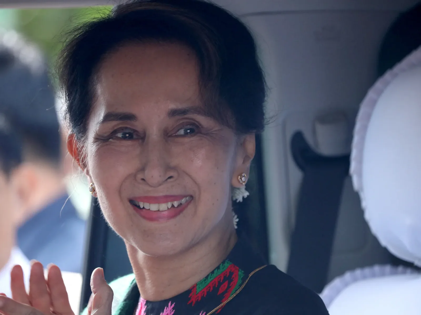 Suu Kyi moved to house arrest as Myanmar trims sentence