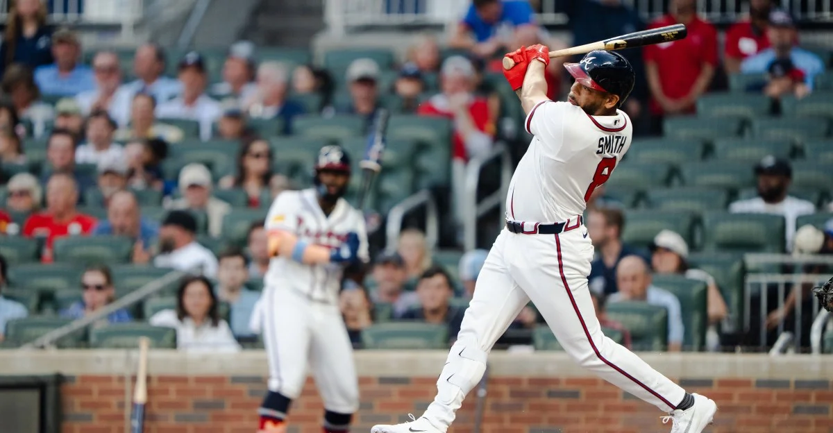 Braves rally with late Smith double, Iglesias notches 100th save