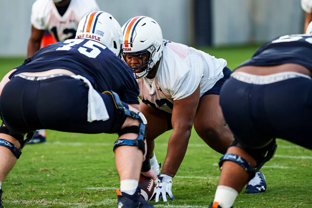 Hugh Freeze praises Auburn's improving offense and quarterback room during spring practice.