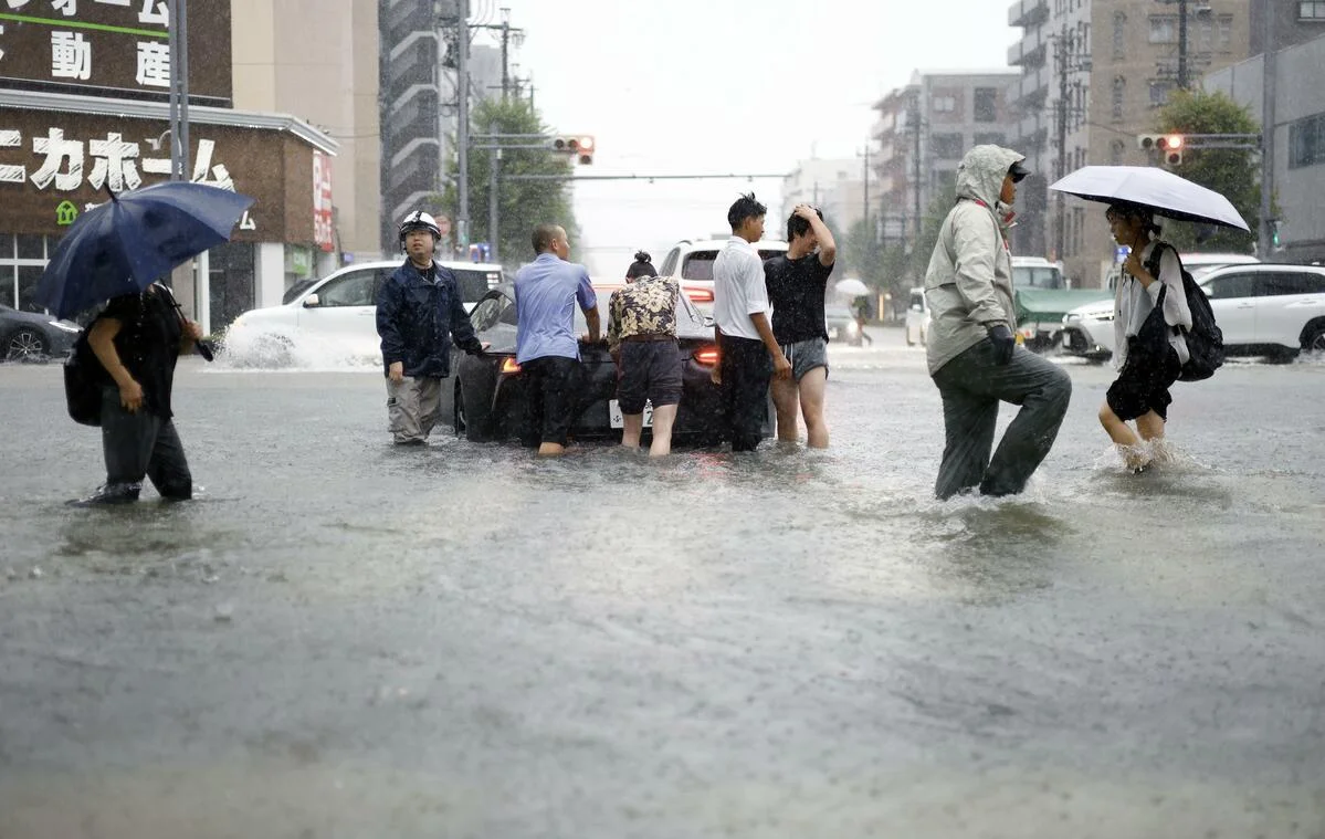 Nagoya drenched as torrential rain triggers highest flood warning and transit disruption