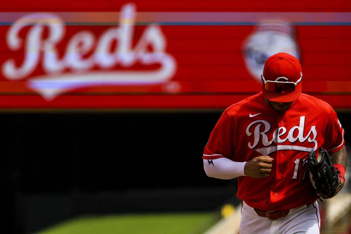 Late-inning lapse sinks Reds in 10-9 loss to Cardinals