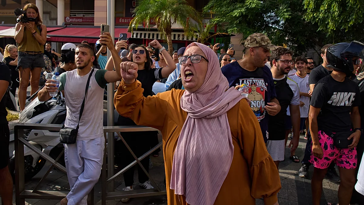 Ceuta's migration crisis sparks second night of protests as clashes and journalist harassment escalate