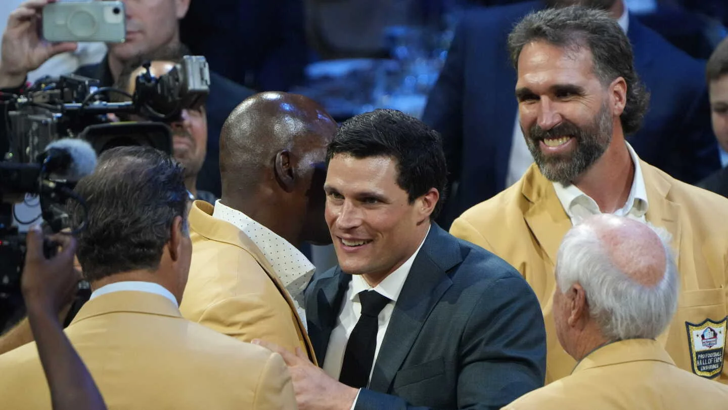 Kuechly Emphasizes People, Joy Over Wins in Hall of Fame Speech