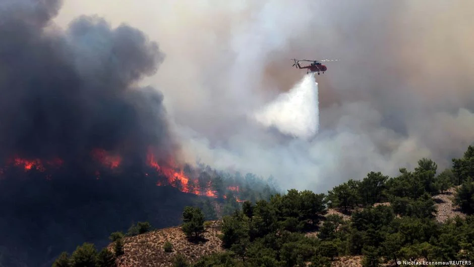"Mass Evacuations as Wildfires Ravage Greece's Vacation Islands"