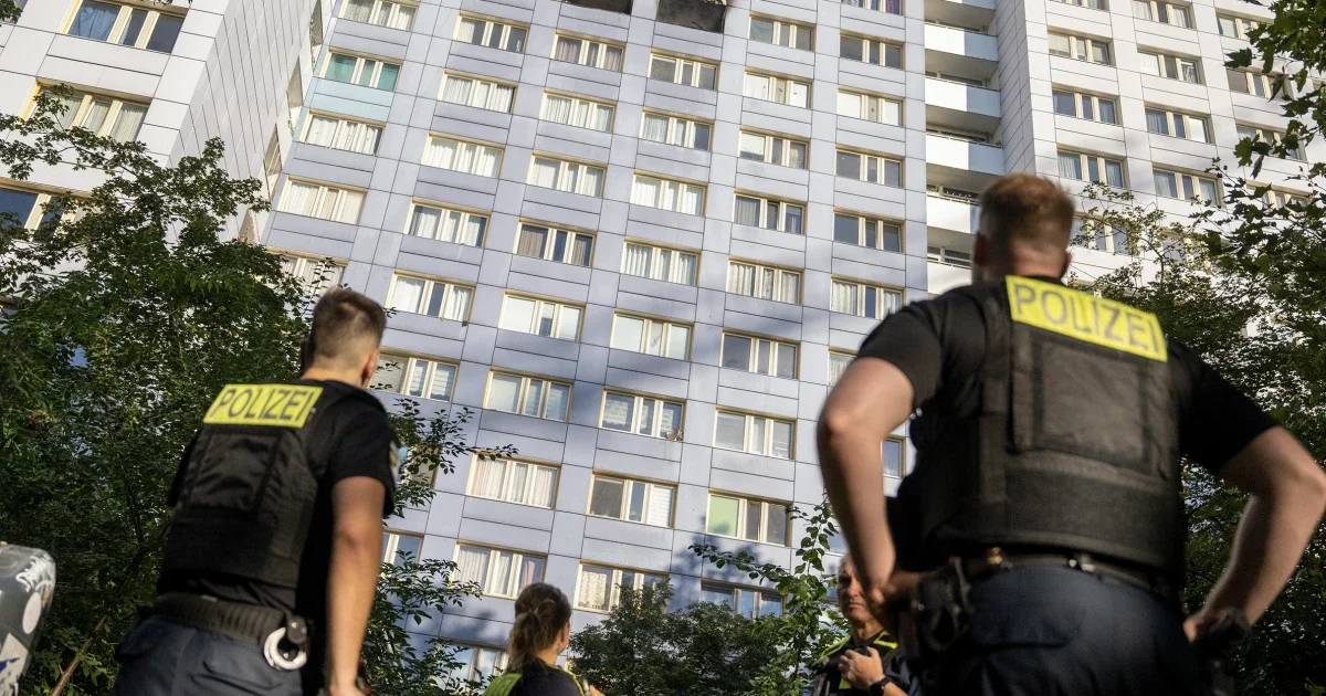 Daring Berlin rescue as resident leaps from 11th floor during 18-story high-rise blaze