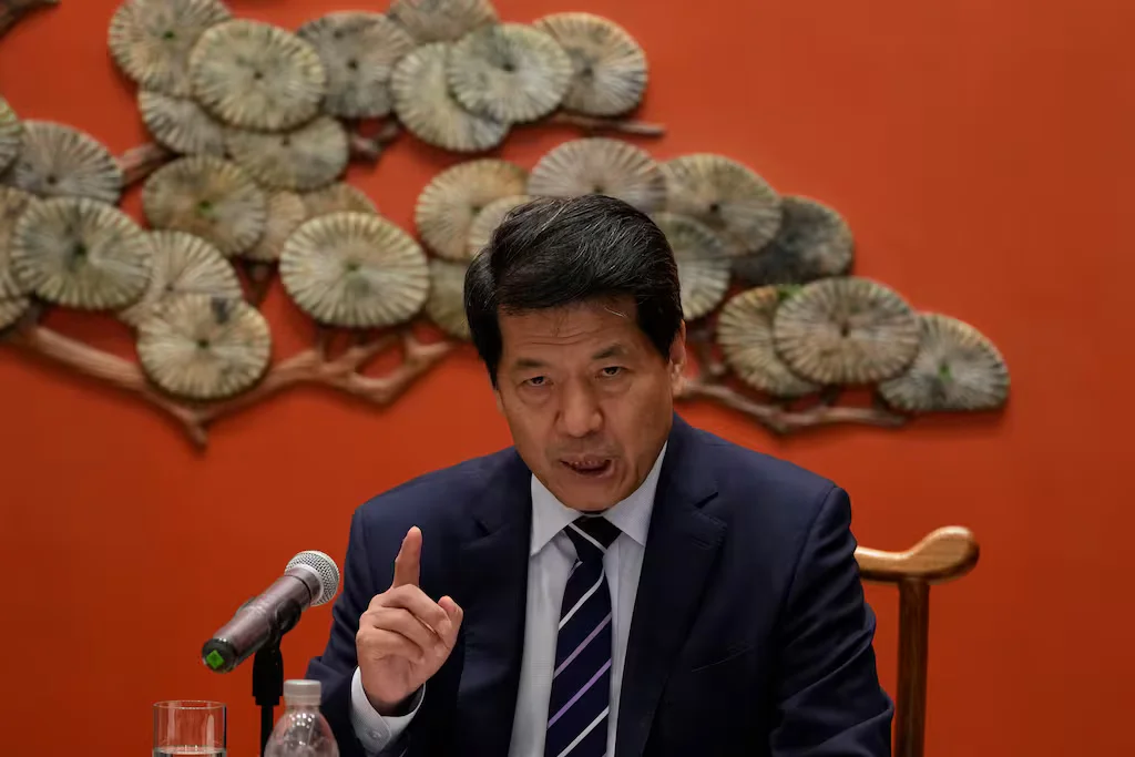 China's envoy urges end to weapon shipments and peace talks in Ukraine conflict.
