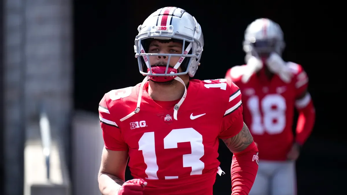 Ohio State WR Kaleb Brown transfers to Iowa, adding to Hawkeyes' offensive arsenal.