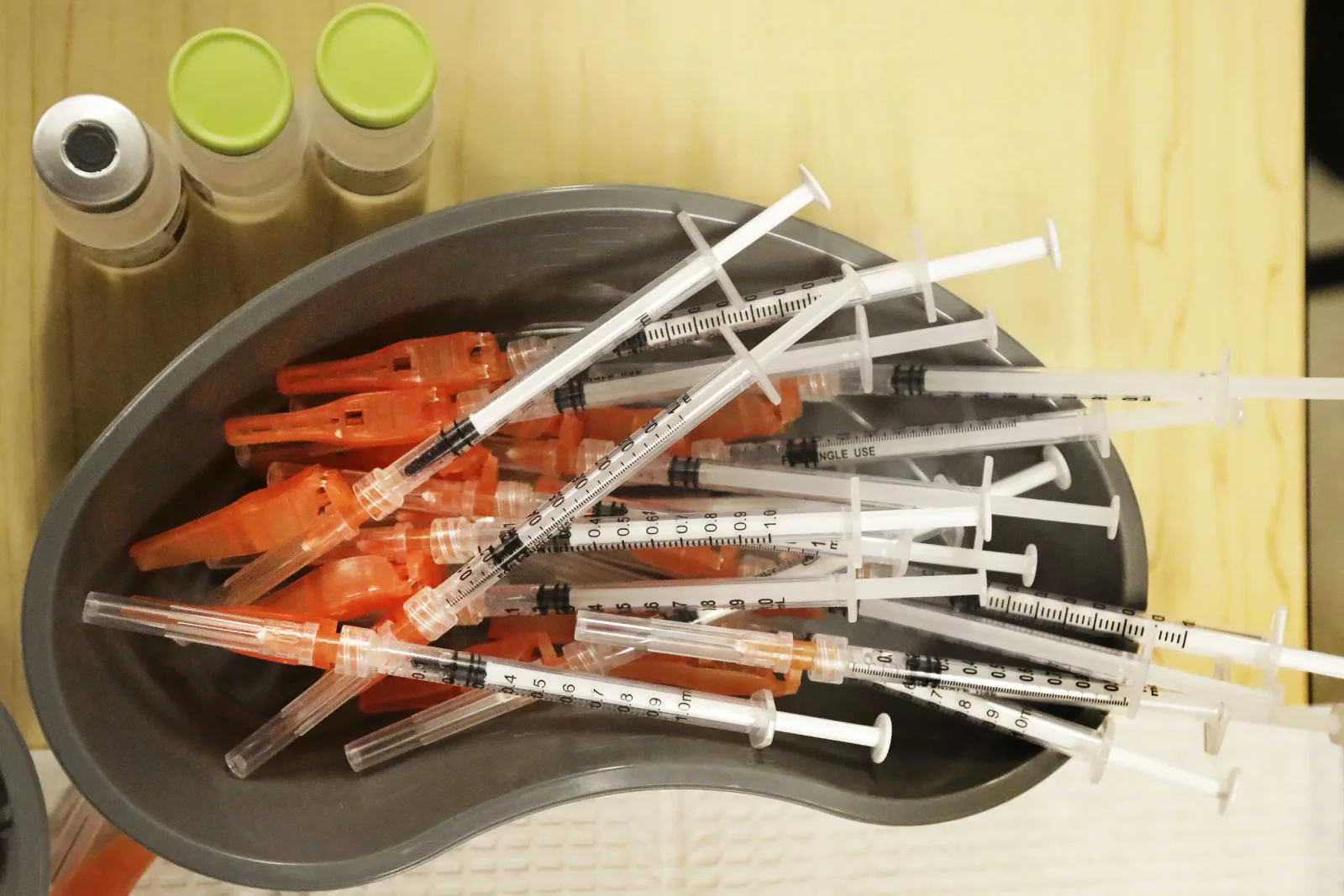 FDA advisers recommend updating COVID vaccines to target omicron strain.