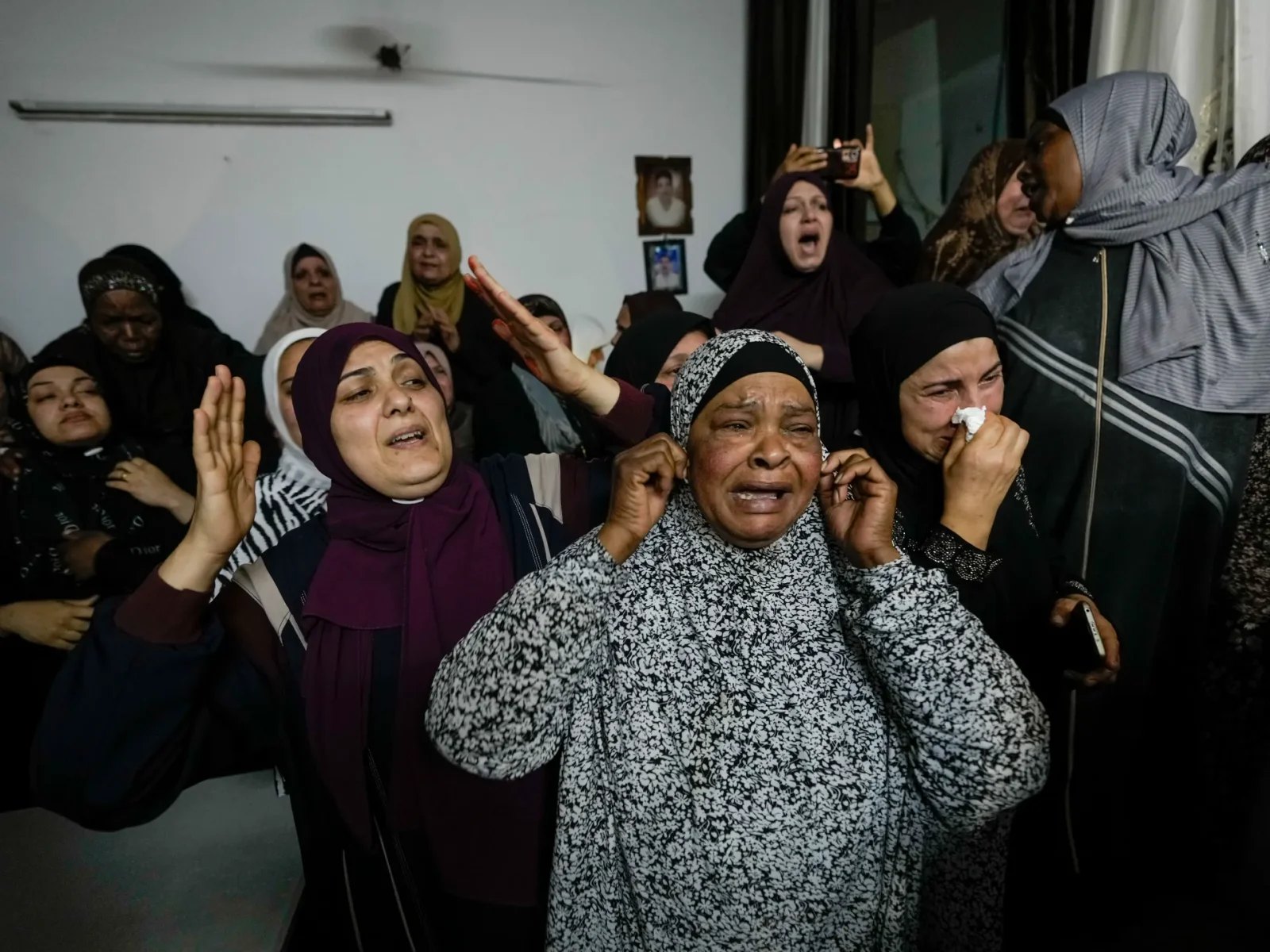 Israeli forces kill 2 Palestinian gunmen in West Bank attacks.