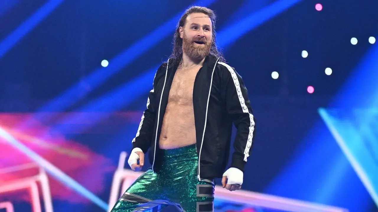 Gunther chokes Cody Rhodes as Sami Zayn walks away on SmackDown