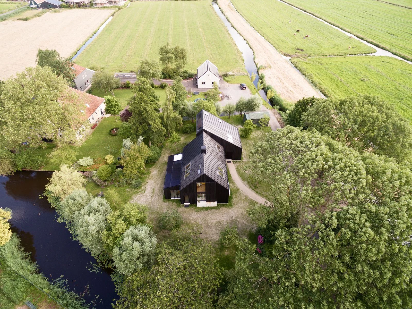 Dutch Farmhouse Finds New Life Under a Black, Energy-Neutral Envelope