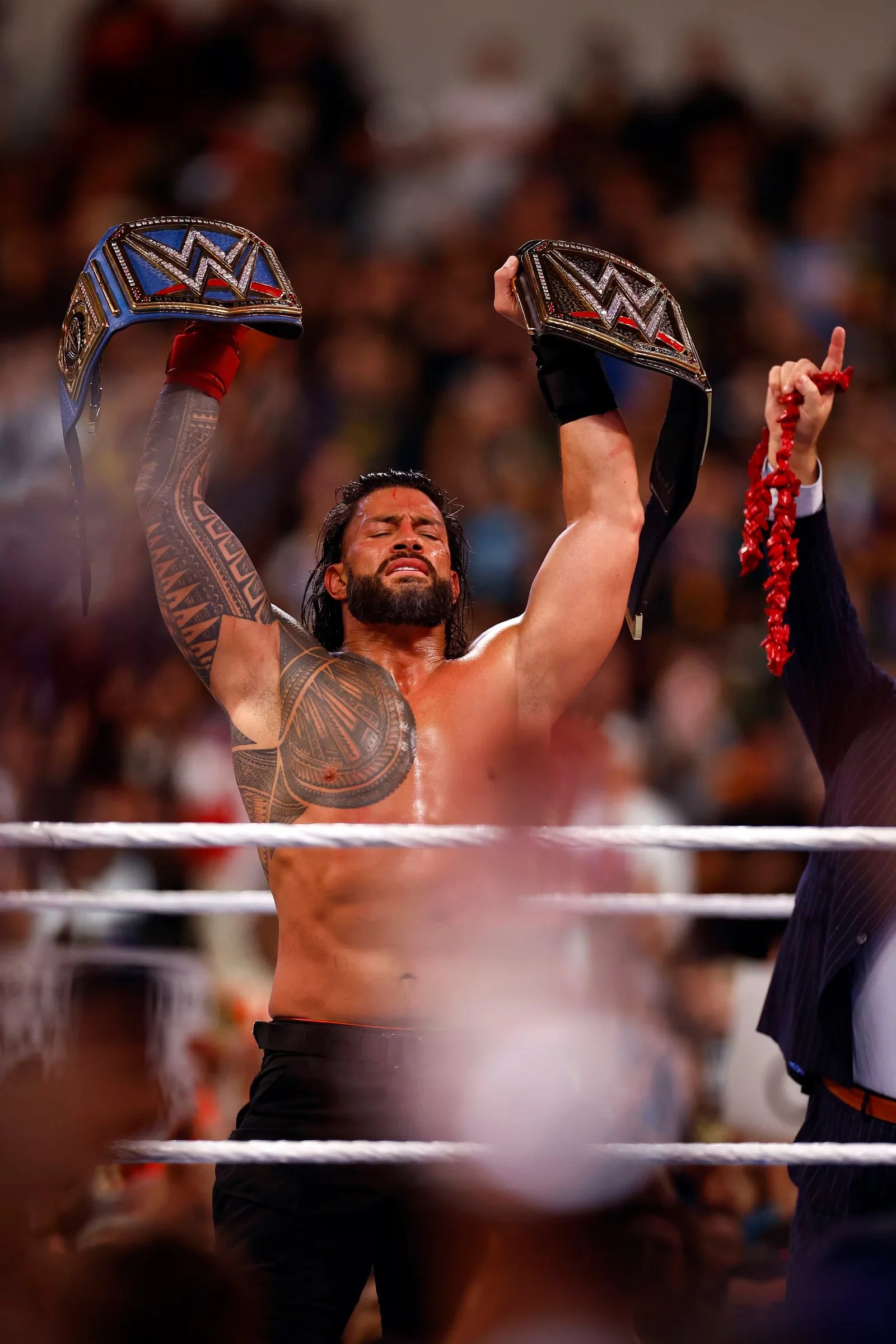 "Roman Reigns' Reign Continues with New WWE Universal Championship Belt"