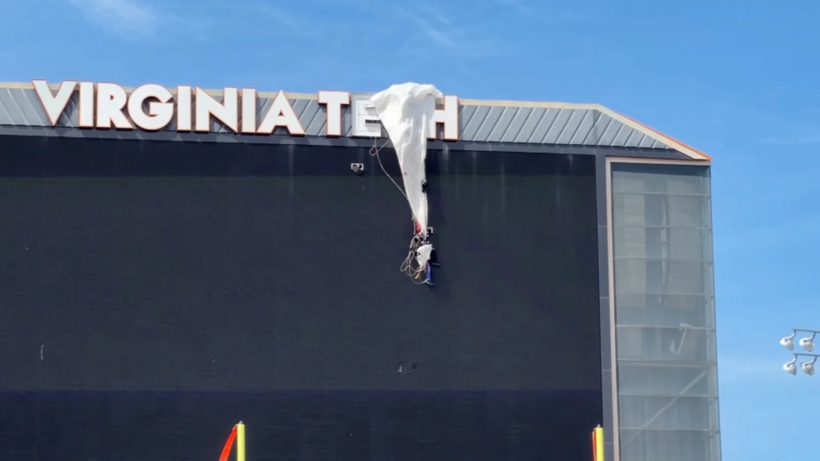 Skydiver crashes into Virginia Tech scoreboard, rescued as spring game delayed