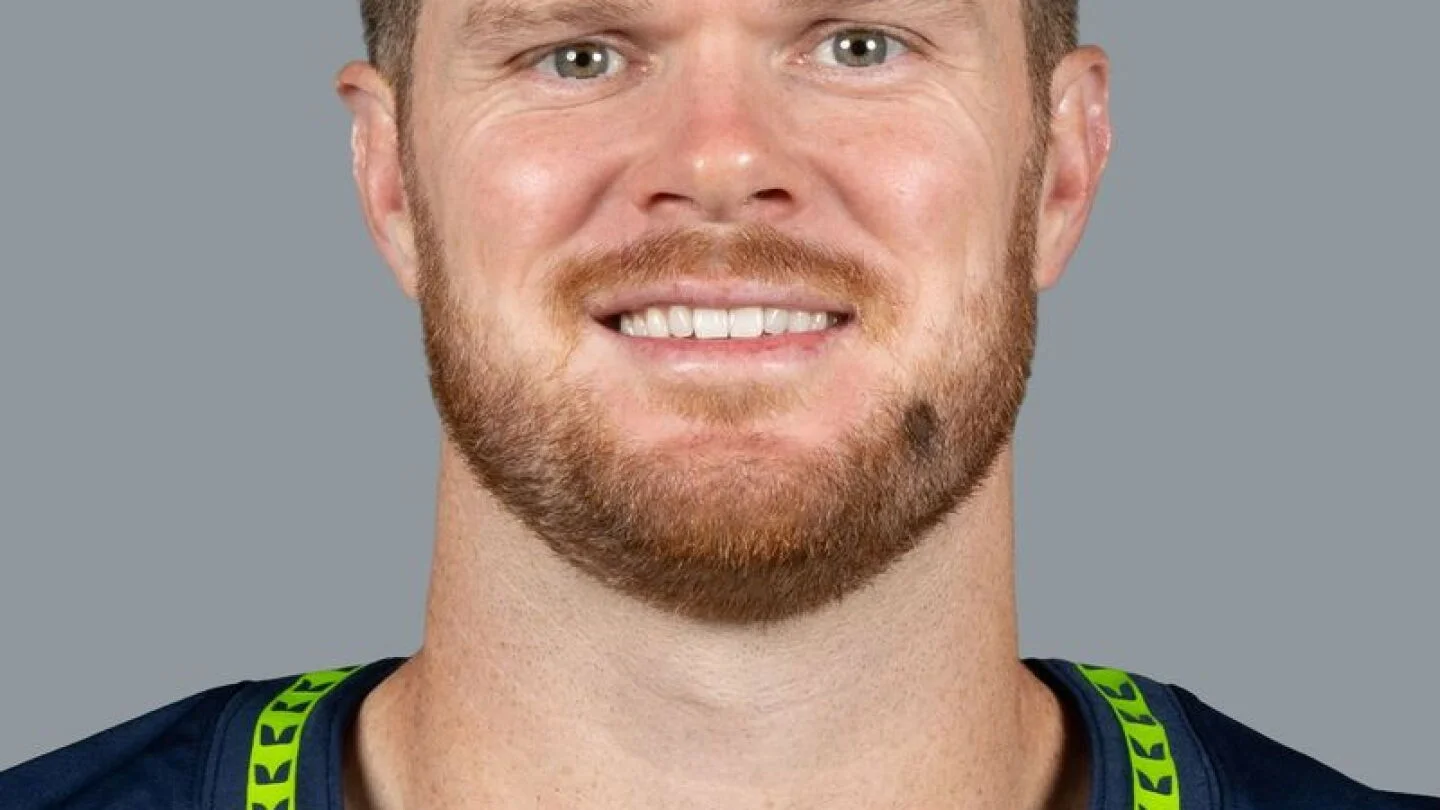 Darnold sidelined by hip injury as Seahawks lean on Lock