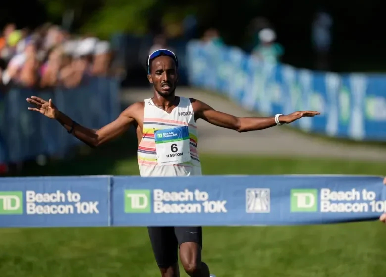 Samuel and Kosgei Seize TD Beach to Beacon 10K Titles