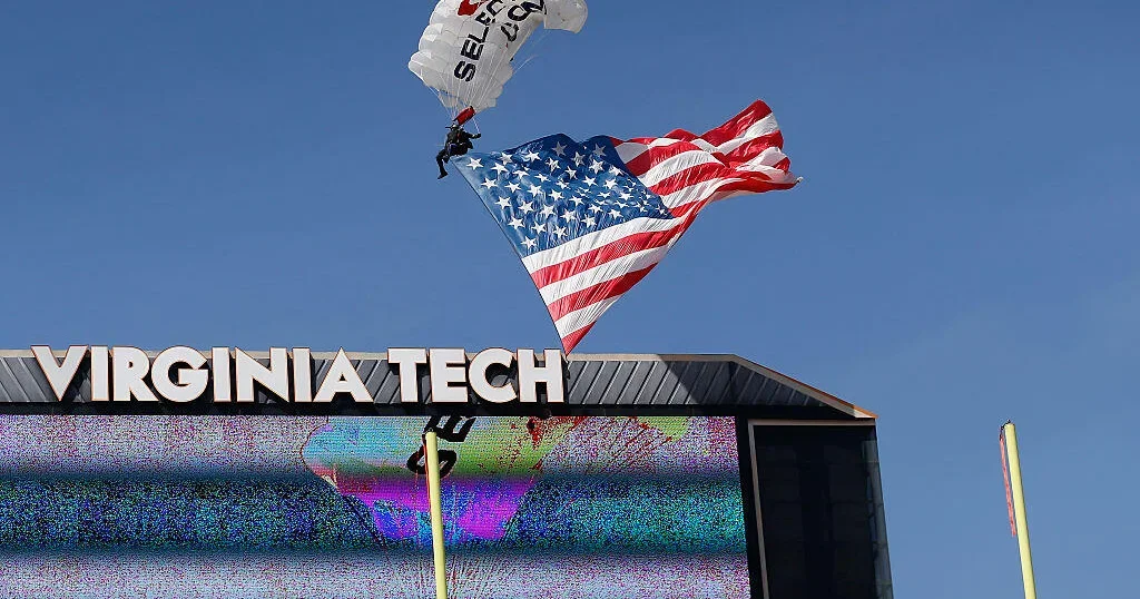 Skydiver rescued after crash into VT scoreboard during spring game