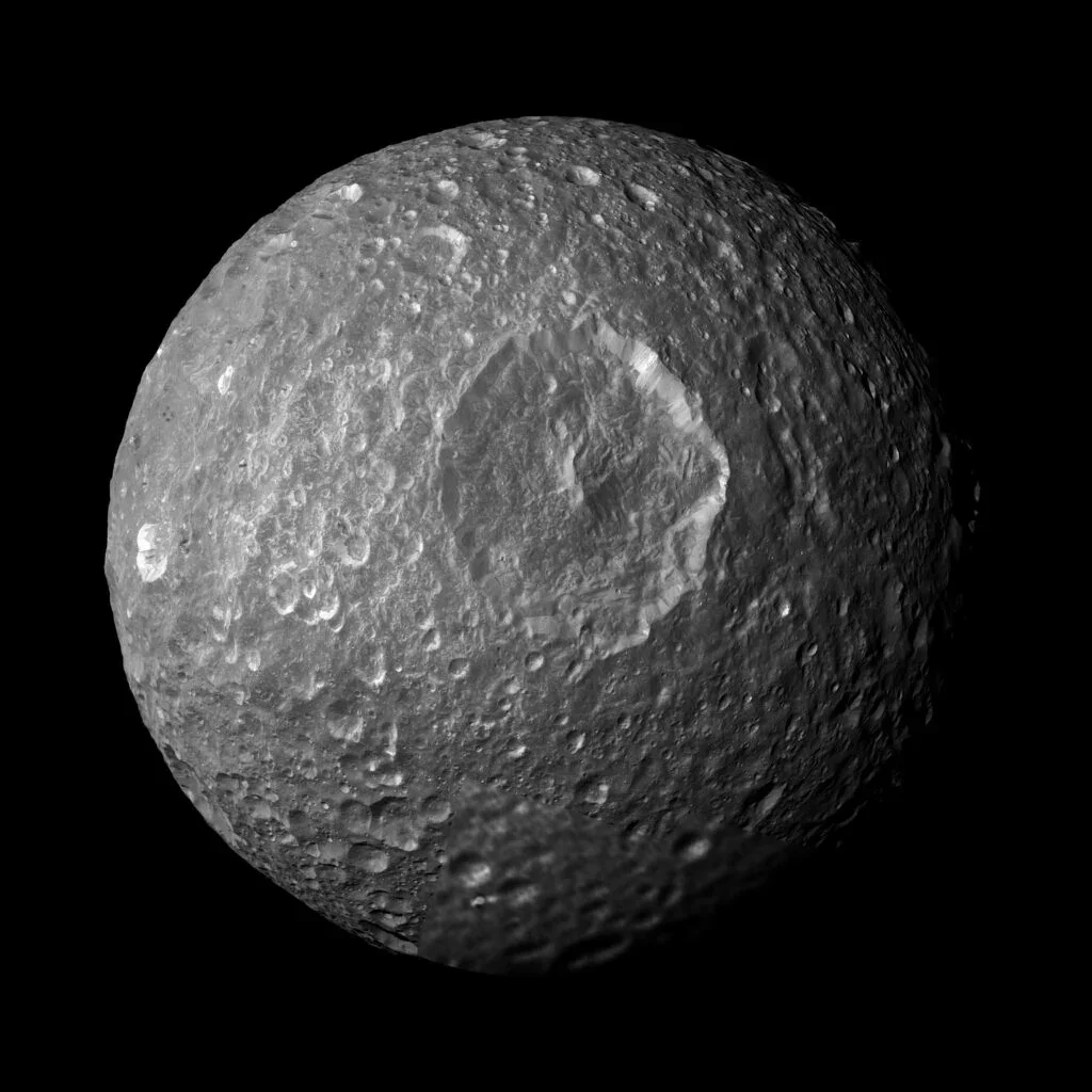 Mimas Rewrites Its Story: A Young Global Ocean Beneath Icy Craters