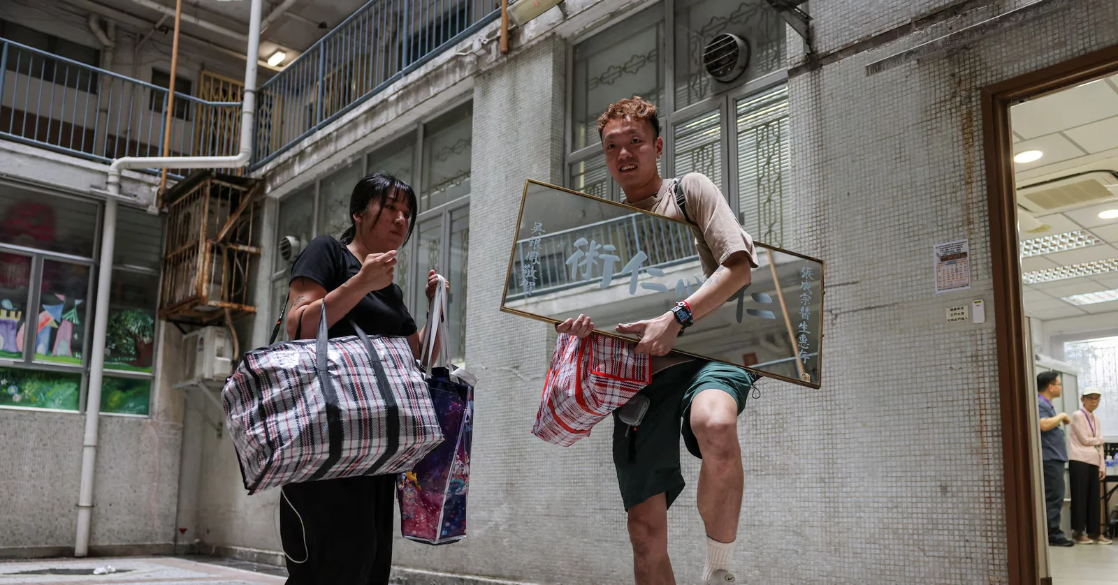 Hong Kong fire survivor finds strength in keepsakes from ruined home