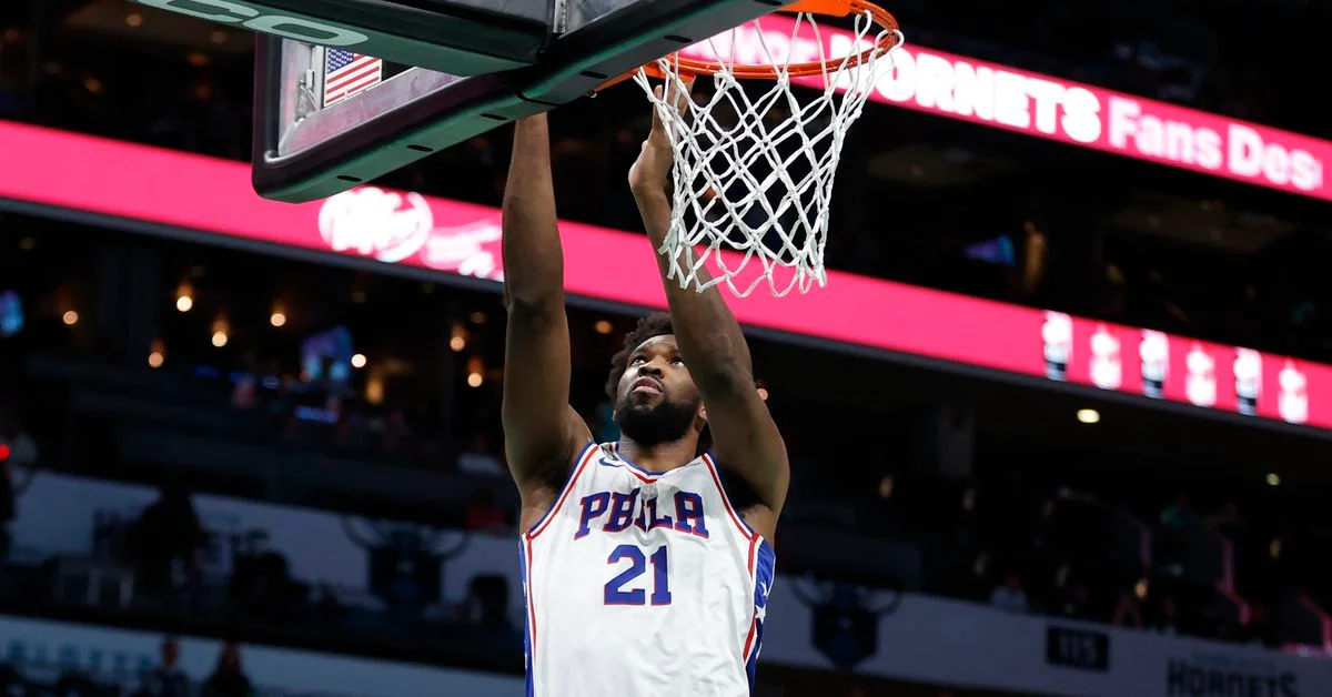 "Embiid leads Sixers to seventh straight win against Hornets"