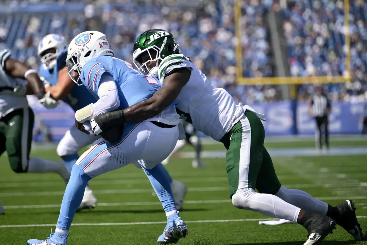 Jets' defense answers the call in season opener against Titans