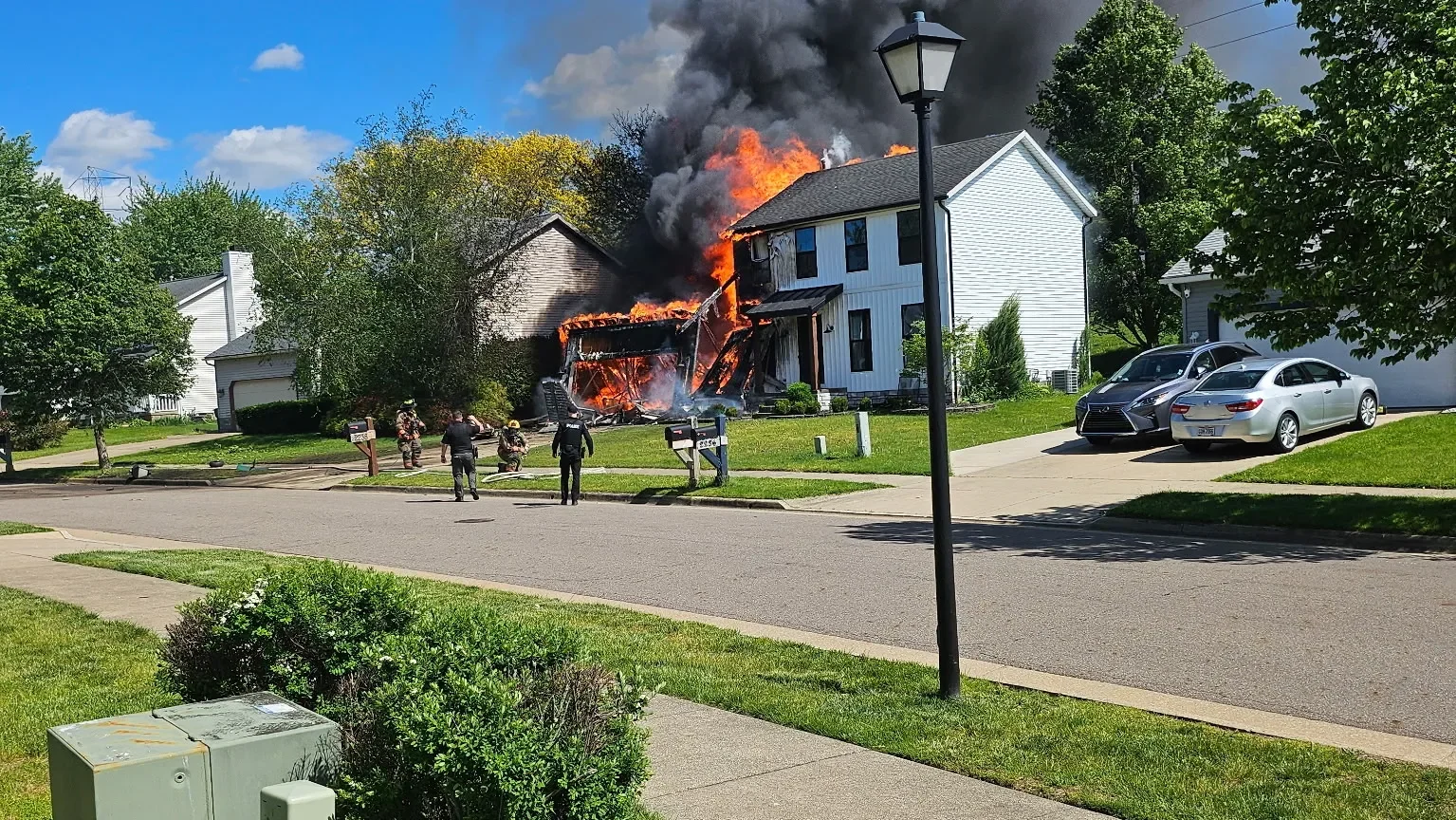 Two Die as Small Plane Crashes Into Akron Home, Igniting Fire