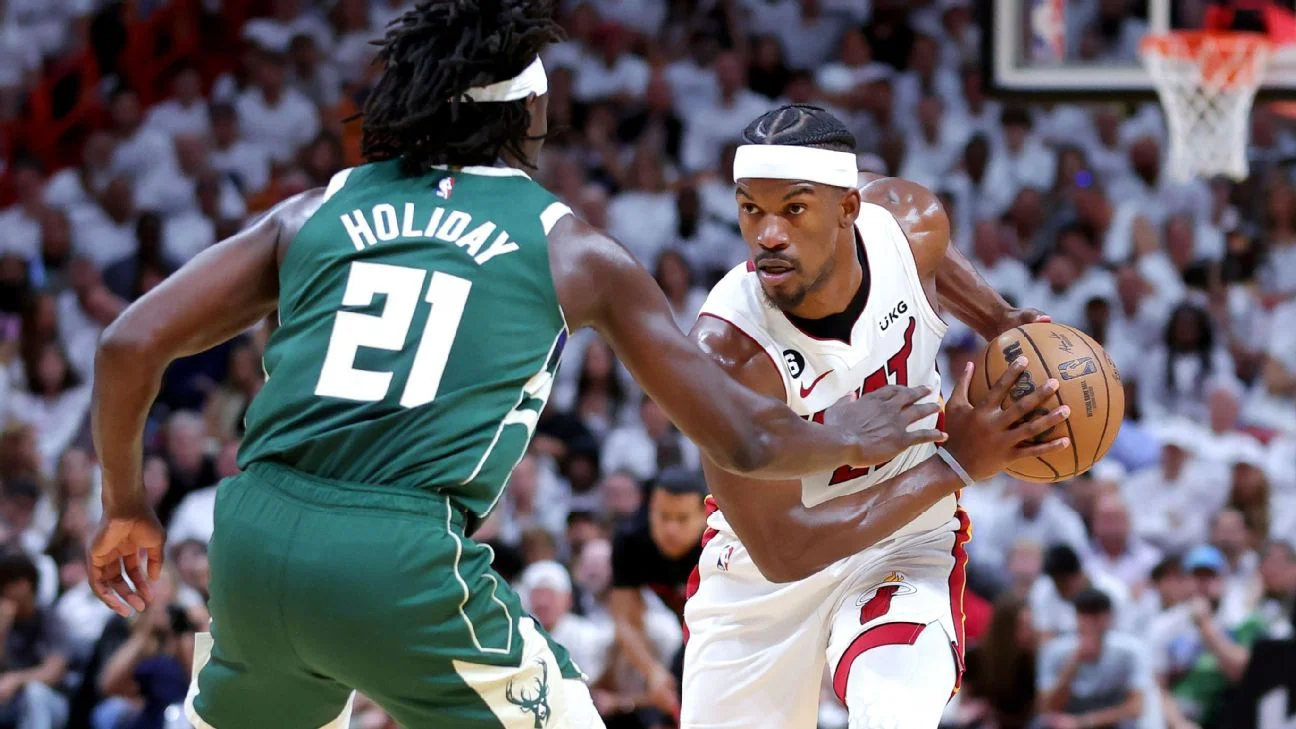 Jimmy Butler's 56-point performance leads Heat to victory over Bucks.
