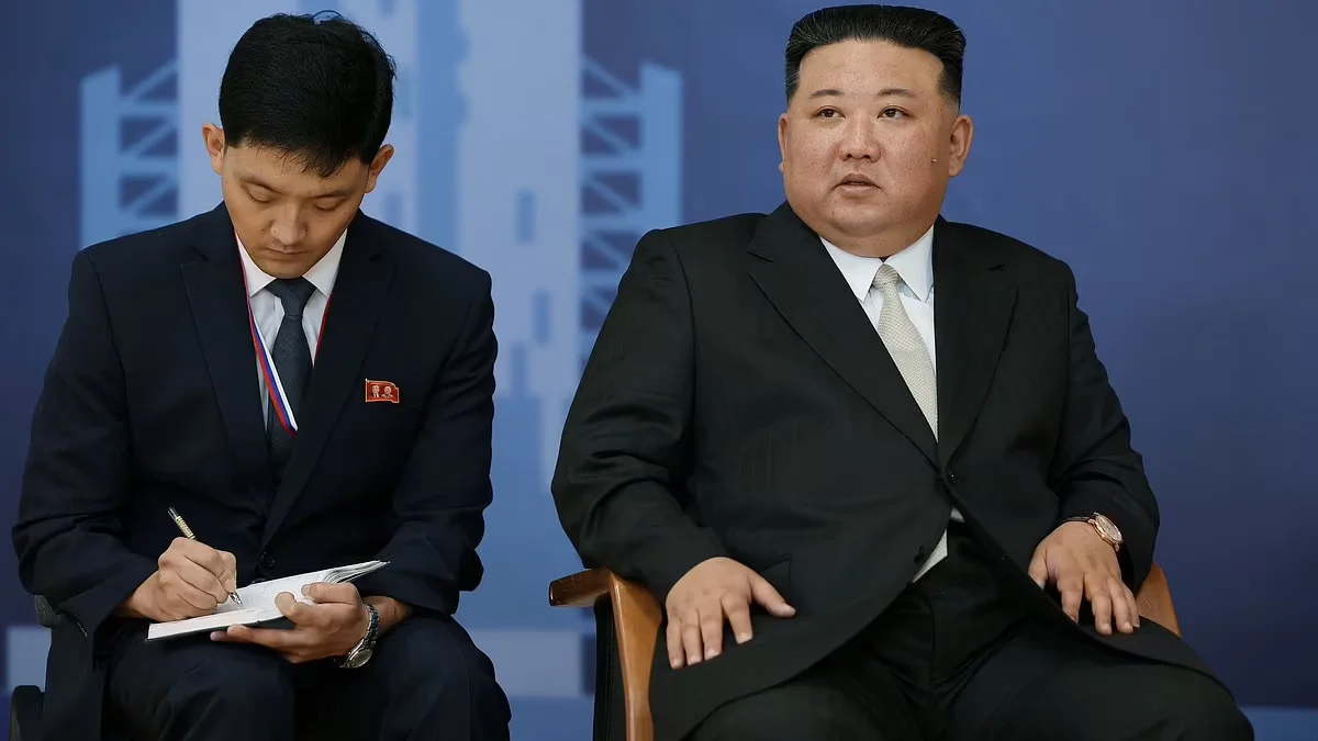 "North Korean Flunky Ensures Kim Jong Un's Chair Can Support His Weight"