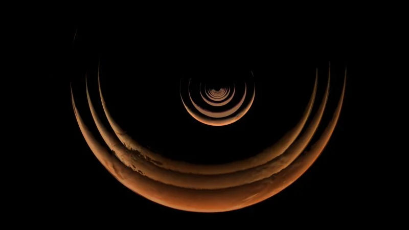 Psyche's Mars Flyby Reveals a Striking Crescent View