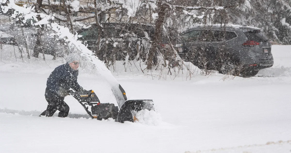 Nor'easter's aftermath: Windy with isolated snow showers in New England.