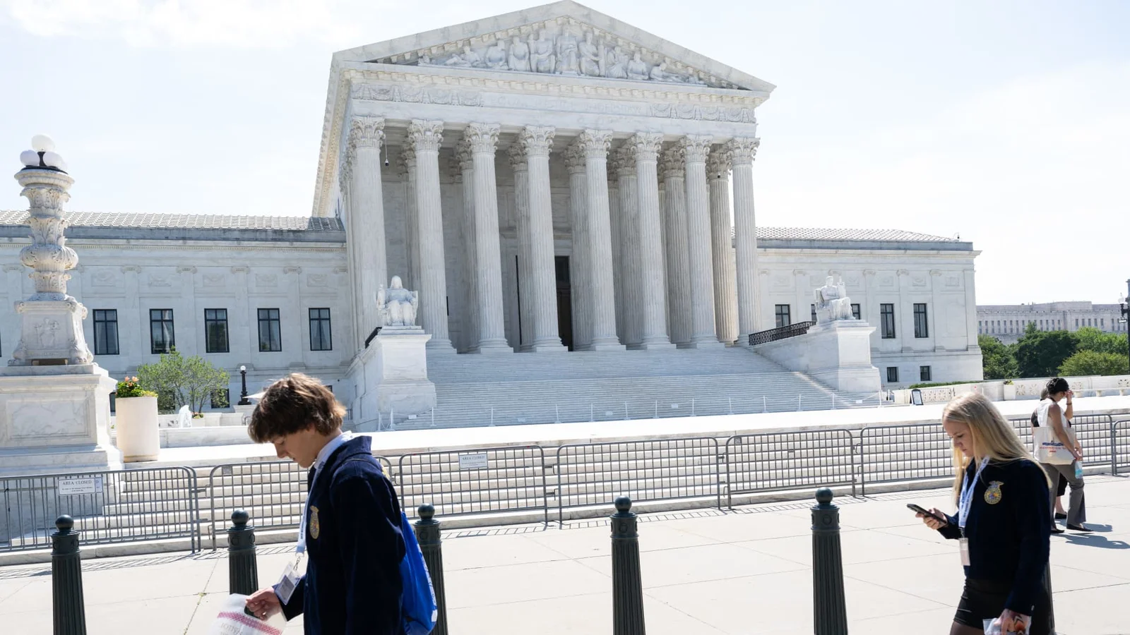Dow tops 52,000 as SCOTUS rulings and Medicare drug coverage reshape markets