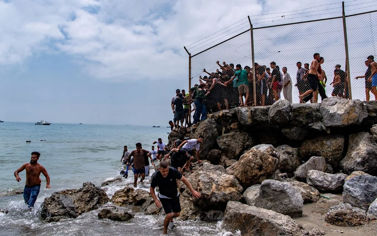 Ceuta threatens to sue Madrid over migrant crisis