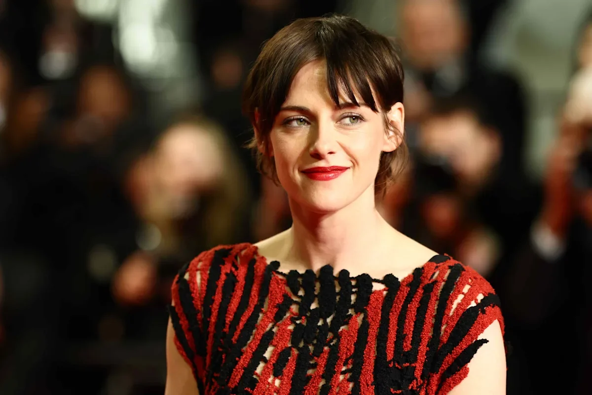 Kristen Stewart Pushes Cannes Boundaries with Curtain Bangs and a String Gown