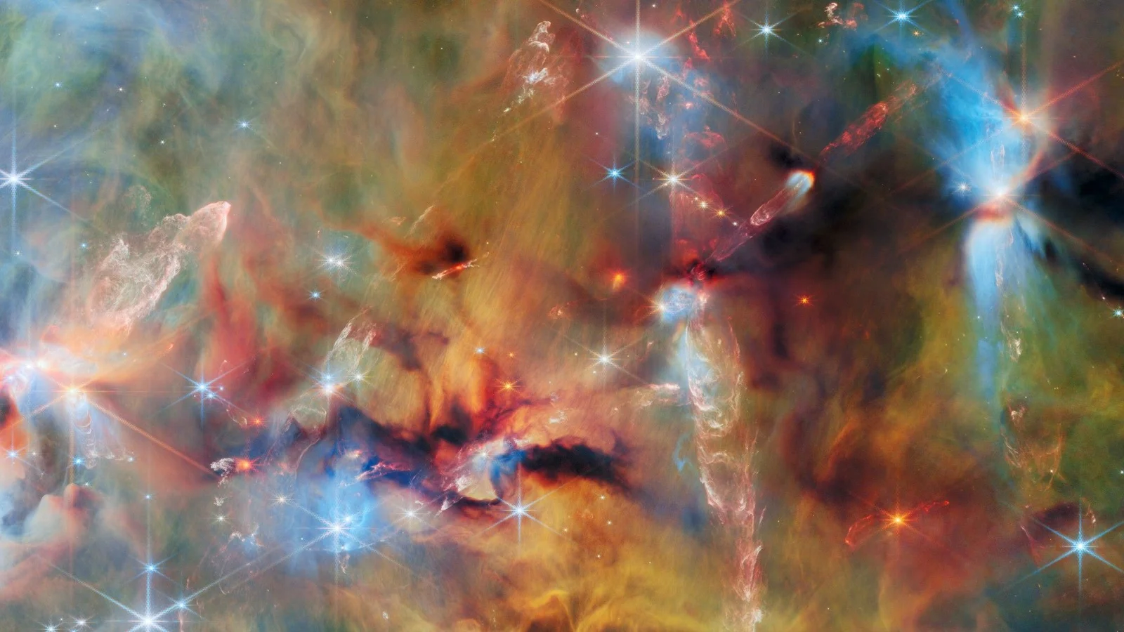 Webb captures newborn stars sculpting Orion’s OMC-2 cloud