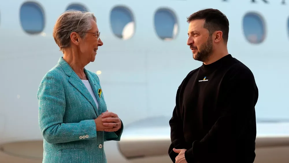 Zelenskyy's Surprise Diplomatic Tour: Meetings with Macron and Merkel.