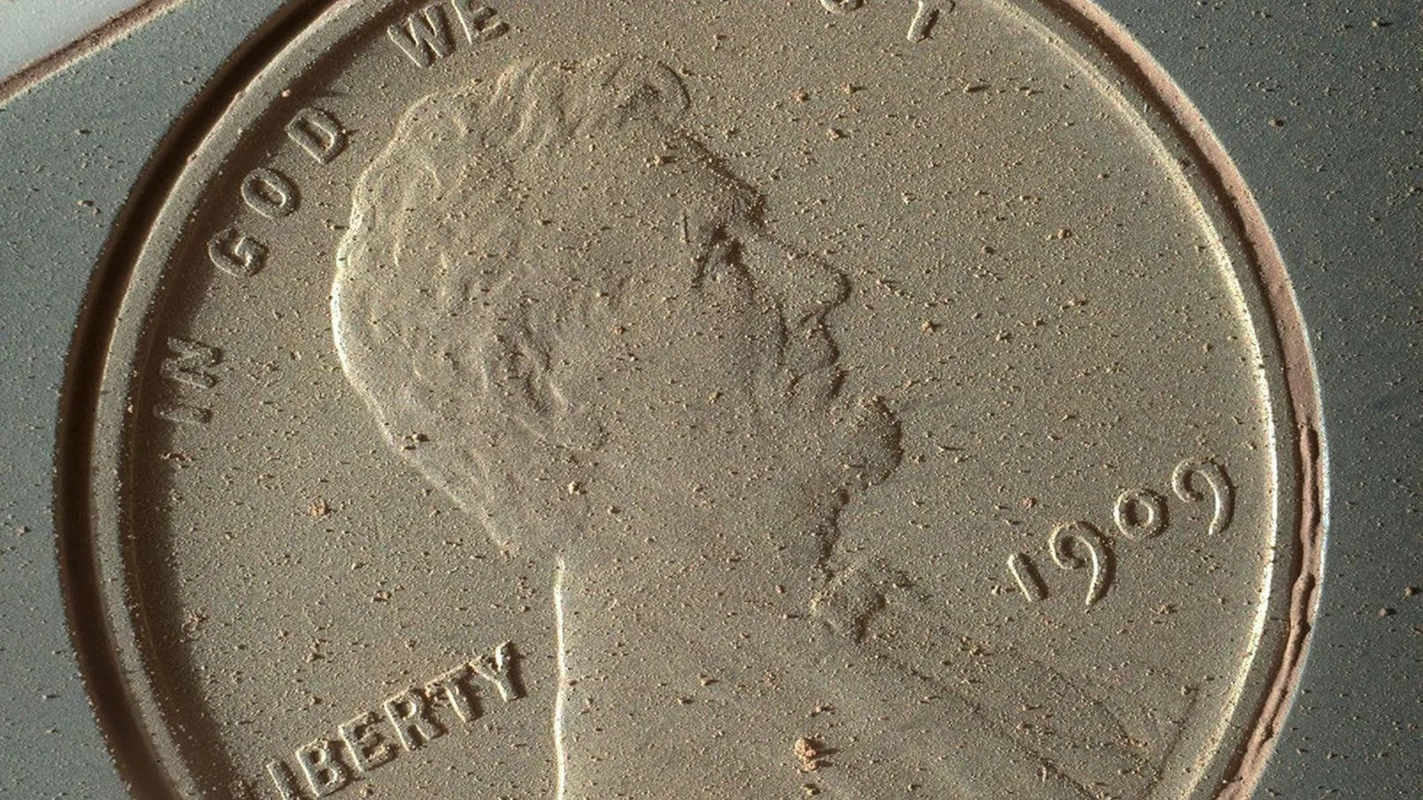 Earthly penny used as scale in Curiosity’s Martian rock photos