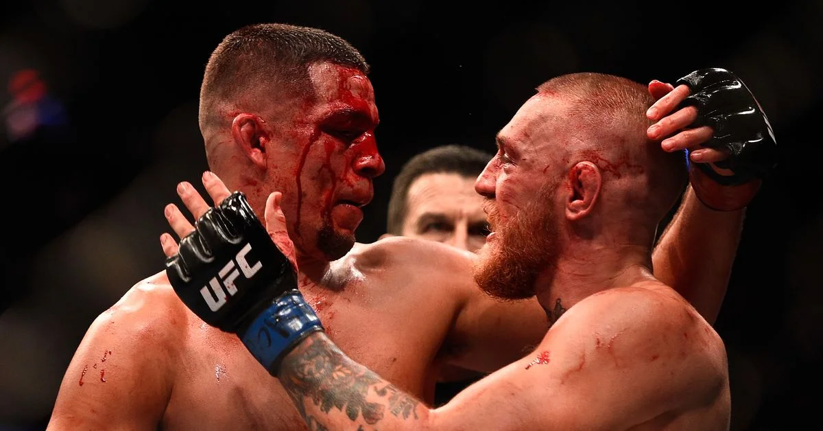 Conor McGregor cheers on Nate Diaz's street fight victory.