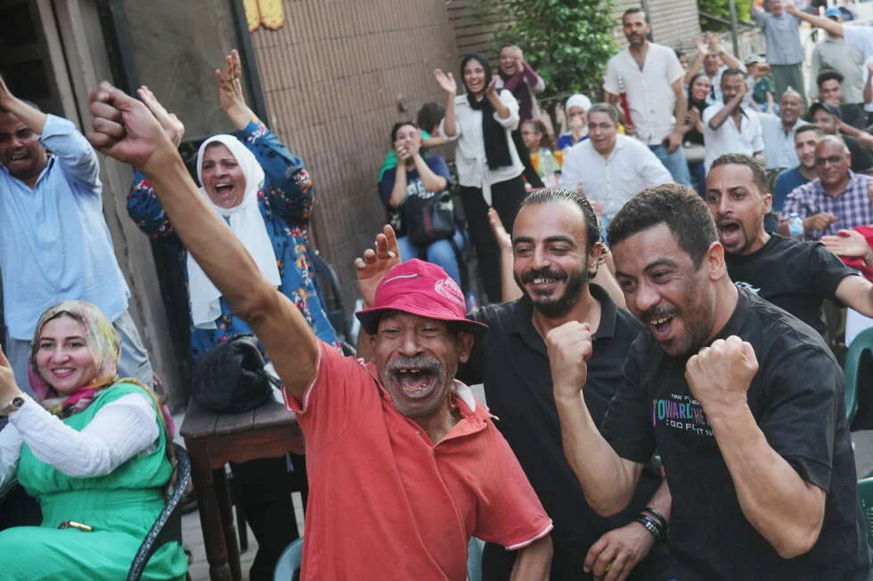 Cairo cafe erupts in celebration, then falls silent after Egypt's 3-2 defeat to Argentina