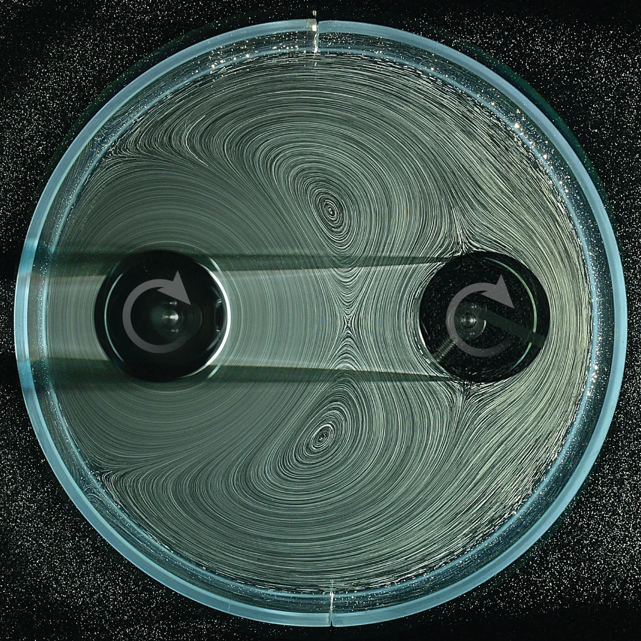 Gears Without Teeth: Fluid Flows Spin Rotors in a Noncontact Engine