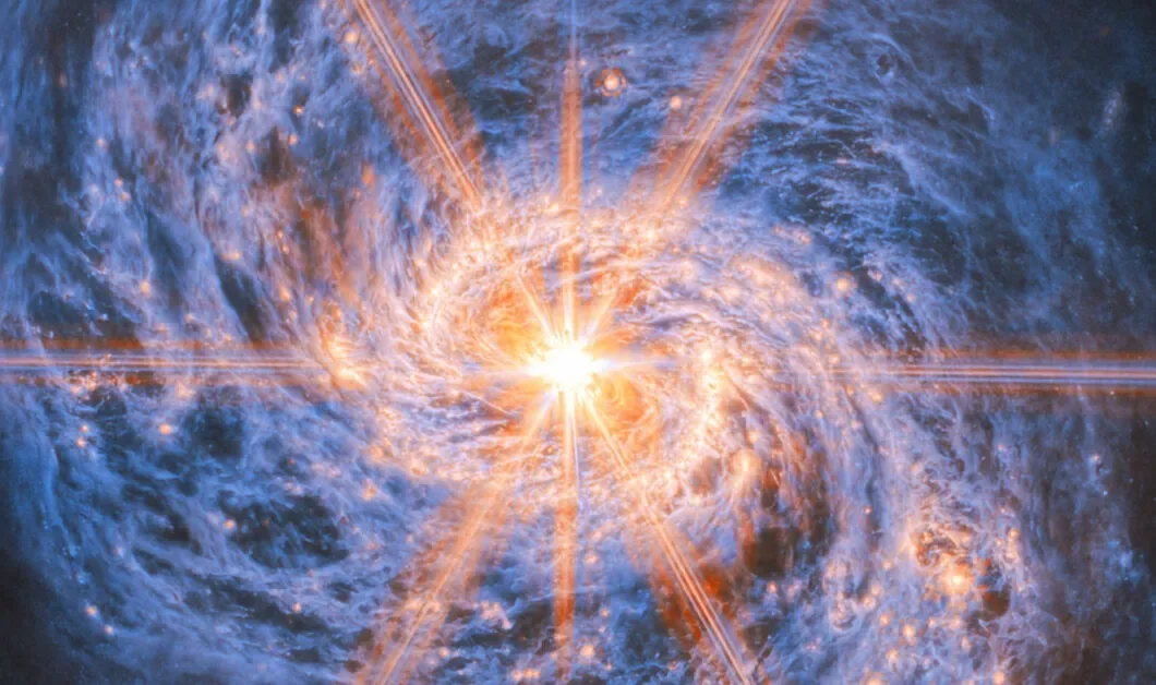 Webb Telescope Reveals Fiery Core and Hidden Bar in the Squid Galaxy