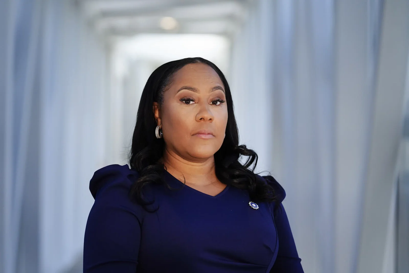 Georgia prosecutor resists Trump's bid to oust her from election investigation.