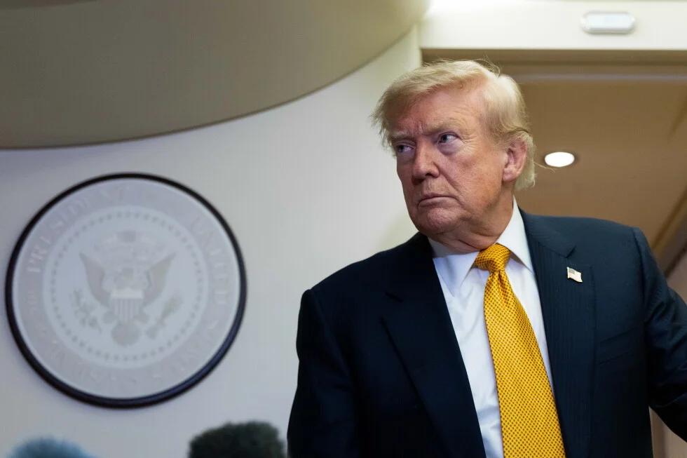 Trump lets housing bill become law without signing to protest GOP voter ID law