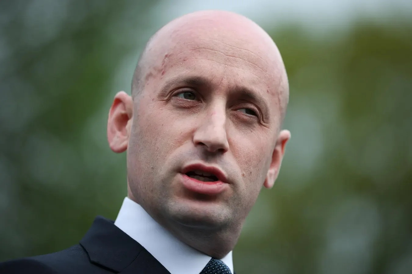 Profanity-Laden Critique of Stephen Miller Sparks Political Backlash