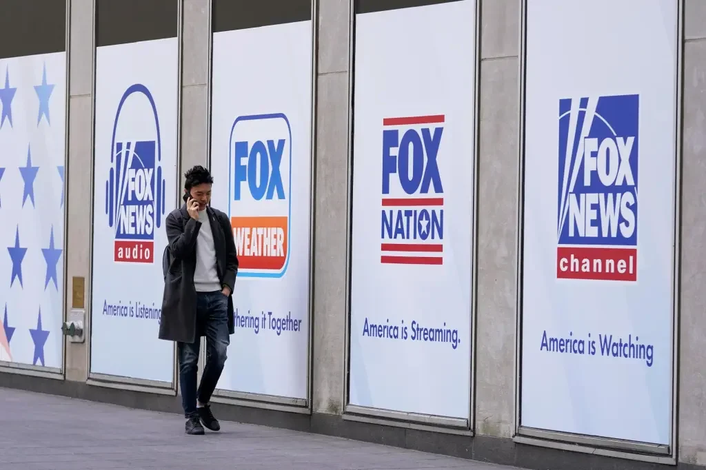 The Legal Battles of Fox News: Settlements and Threats.