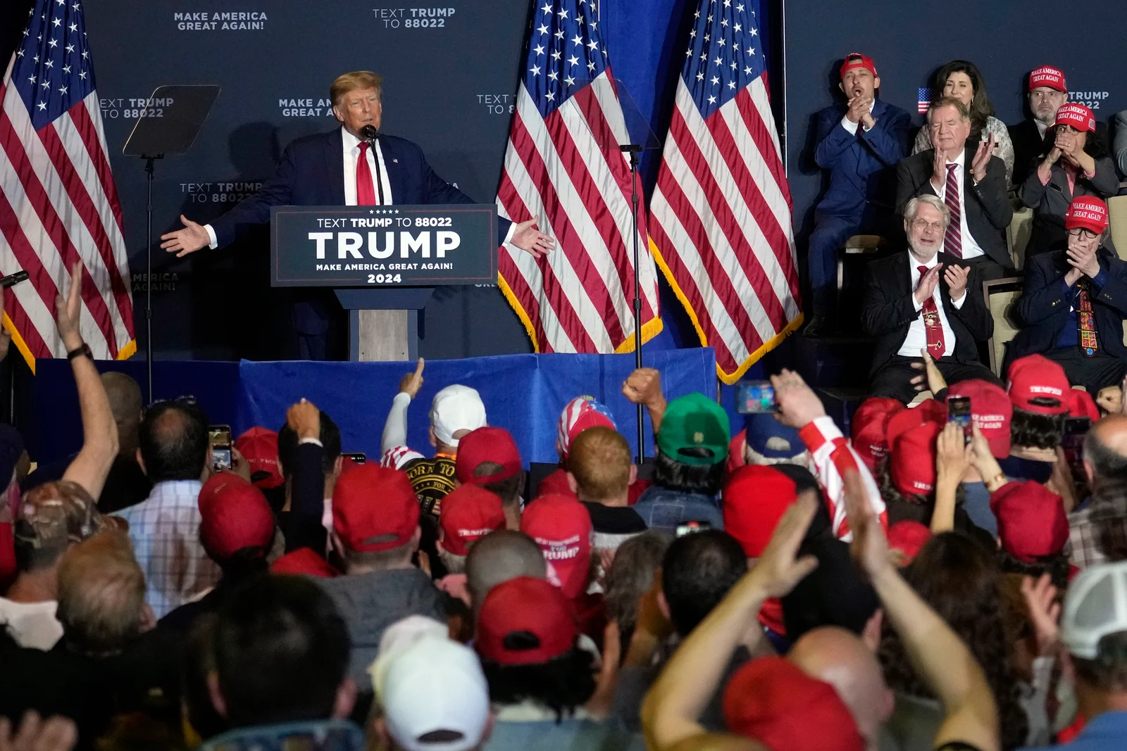 Trump rallies supporters in New Hampshire, targets Biden rematch.