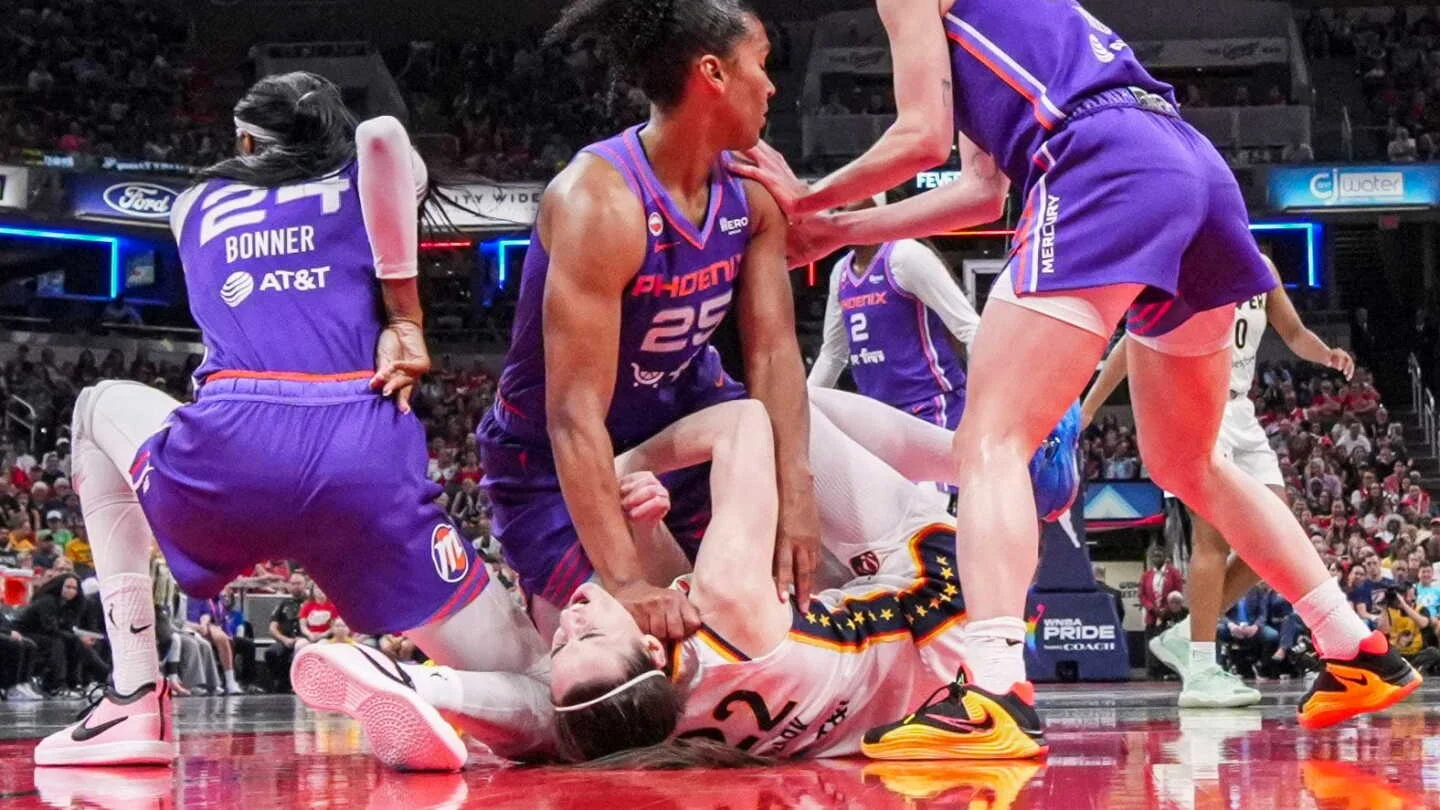 Clark exits Fever game with back injury, sidelined after third-quarter scare