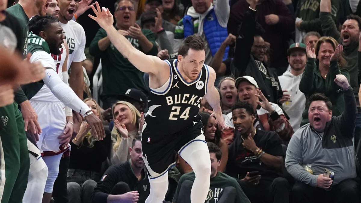 Bucks break playoff record with 25 3-pointers in Giannis' absence to defeat Heat.