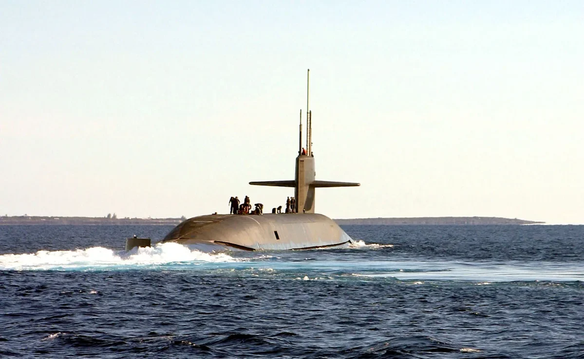 Iran condemns US 'warmongering' over submarine deployment.